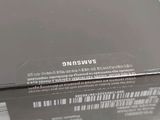 a close up of the back of a samsung phone