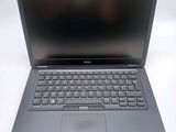 the dell laptop is open and ready to be used
