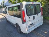 a white van that is parked on the side of the road