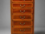 a small wooden chest of drawers with five drawers on each side