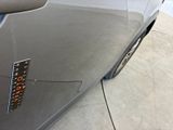a close up of a car with a sticker on the side of it