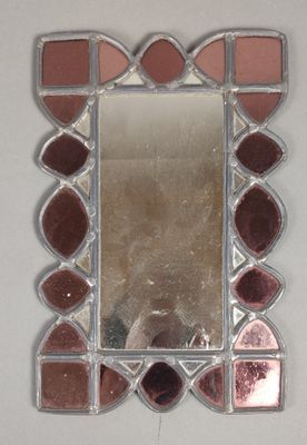 a mirror that is sitting on the wall