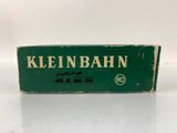 a close up of a box of cigarettes on a white surface
