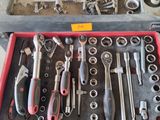 a box of tools that are sitting on a table