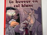 une photo d'un livre sur lequel figurent un homme et un canard
