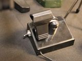a metal device that is sitting on a table