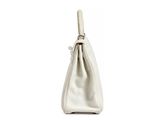 a white handbag with a zipper on the inside of it
