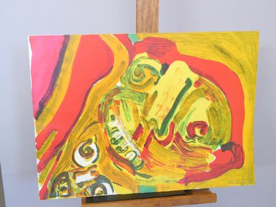 a picture of a painting on a easel in a room