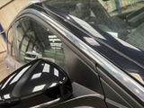 a close up of a car ' s side view mirror