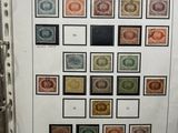 a white sheet of paper with a bunch of different stamps on it