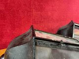 a small boat that is sitting on a wooden table