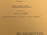 an old document with a black and white image of a man ' s face