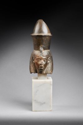 a statue of a woman with a helmet on her head