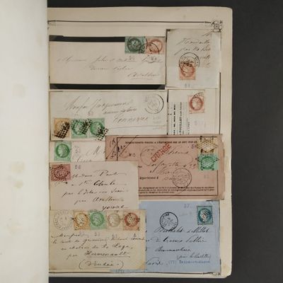 an old book with a bunch of different stamps on it
