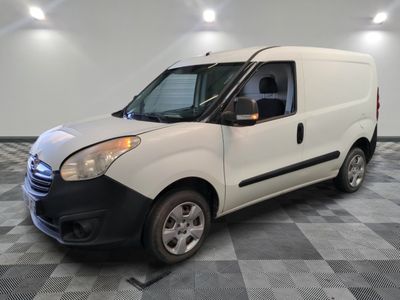 a picture of a white van parked in a garage