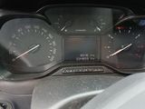 a close up of a car dashboard with a speedometer and gauges
