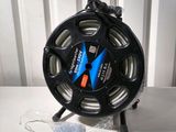 an image of a reel with a bag of ice sitting on top of it