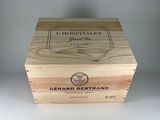 the box is made of wood and has a logo on it