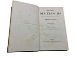 an old book opened to a page with a picture of the title