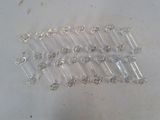 a lot of clear glass pieces on a table