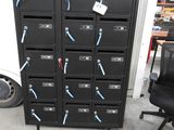 a black filing cabinet with a bunch of keys on it