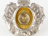 une broche en argent et en or représentant un lion