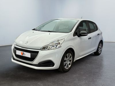 the white car is parked in a room with a black floor