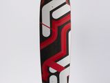 the skateboard has a red and black design on it