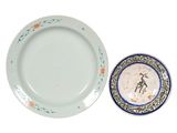 a plate and a plate with a picture of a bird on it
