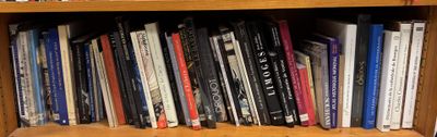 a book shelf with a lot of books on it