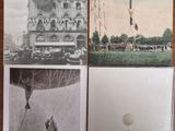 plusieurs vieilles photos de personnes et une montgolfière sur une table