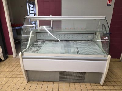 a refrigerated display case in a restaurant