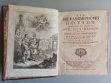 an old book with a picture of a man and a woman on it