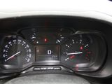 a close up of a car dashboard with a speedometer and gauges