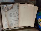 a box full of old books sitting on a table