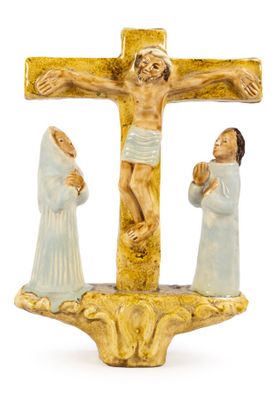 two figurines of jesus and mary on a cross
