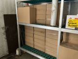 many boxes of food on a shelf in a room