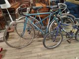 two bikes that are sitting on the floor in the room