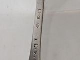a spoon that has a spoon on it with the word eat