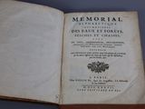an open book with a picture of a bird on it
