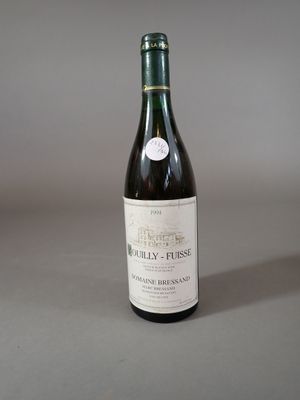 a bottle of wine that is sitting on a table