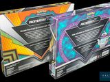 two boxes of pokemon trading cards are shown on a black background
