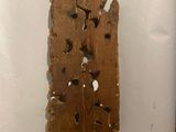 a piece of wood that has been cut in half