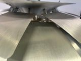 a close up view of a machine that is cutting metal
