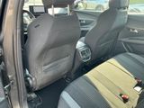 a car that has two seats in the back of it