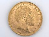 an image of a gold coin with a man ' s face on it
