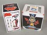 two boxes of action figures are sitting next to each other on a table