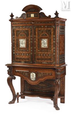 an old wooden cabinet with a clock on top of it