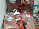 three bags of children ' s halloween costumes sitting on a table
