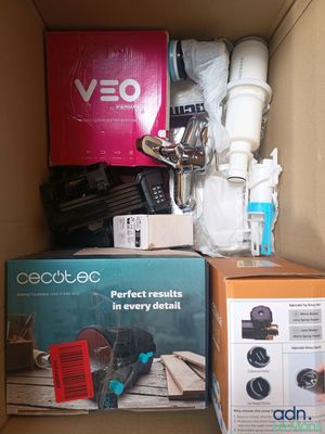 a cardboard box with a bunch of items inside of it